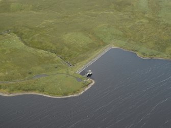 Oblique aerial view centred on the dam, taken from the W.