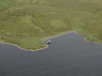 Oblique aerial view centred on the dam, taken from the SSW.