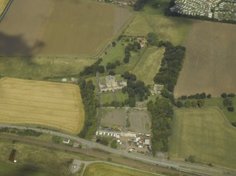 General oblique aerial view centred on the house, taken from the SSE.