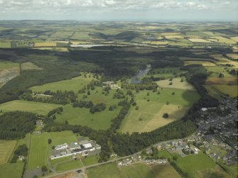General oblique aerial view centred on the country house, stables and policies, taken from the S.