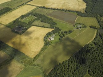 Oblique aerial view centred on the house, taken from the SW.