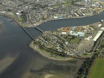 General oblique aerial view of the bridge and viaduct, taken from the SW.