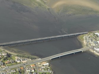 Oblique aerial view centred on the bridge and viaduct, taken from the SE.