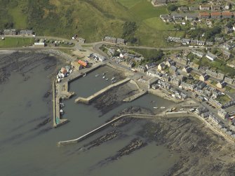 Oblique aerial view centred on the harbour, taken from the SE.