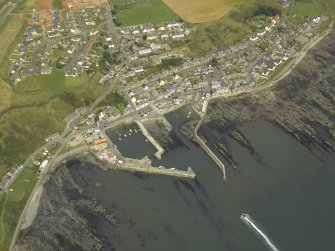 Oblique aerial view centred on the harbour, taken from the SSW.