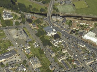 Oblique aerial view centred on Invercowie house and garden, taken from the SW.