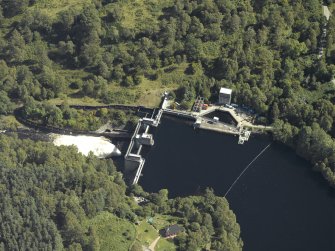 Oblique aerial view centred on the dam, taken from the W.