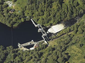 Oblique aerial view centred on the dam, taken from the ESE.