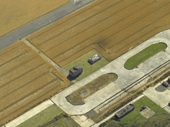 Oblique aerial view centred on the control tower, taken from the N.