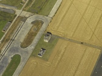 Oblique aerial view centred on the control tower, taken from the SW.