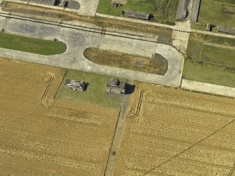 Oblique aerial view centred on the control tower, taken from the SE.