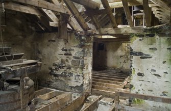 Interior. First floor. Looking towards first floor of storage area. The floor had been removed due to rotting.