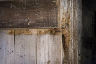 Interior. Ground floor. Storage area, detail of hinge to kiln area door.
