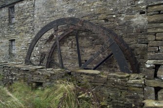 View of remains of waterwheel.