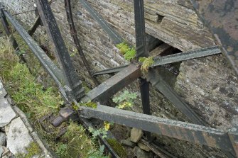 Detail of waterwheel pit and axle as it enters the mill building.