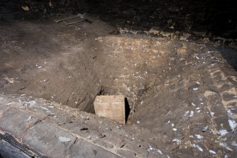 Interior. Ground floor. Kiln area. Top of square-shaped funnel arrangement above firebox. This concentrats the heat upwards to the perforated kiln floor above.