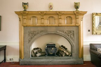 Interior.  Detail of Sir Robert Lorimer designed fireplace in Ante-Room.