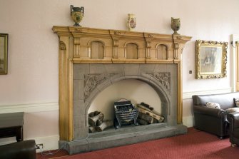 Interior.  Detail of Sir Robert Lorimer designed fireplace in Ante-Room.