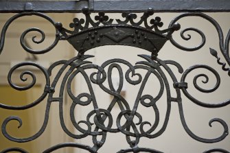 Interior.  Detail of staircase balustrade, monogram of the 2nd Earl of Annandale and his wife, formerly Sophia Fairholm.