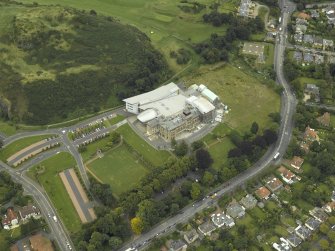 Oblique aerial view centred on the new business school extension of Napier University, Craiglockhart Campus, taken from the NW.