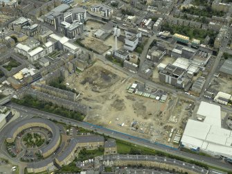 Oblique aerial view centred on the former Fountain Brewery site, taken from the NW.