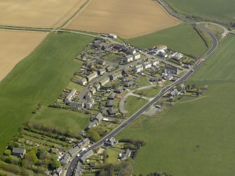 General oblique aerial view of the village, taken from the SW.