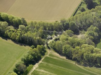 Oblique aerial view centred on the lodge, taken from the NE.