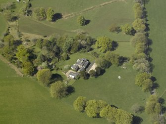Oblique aerial view centred on the cottage, taken from the ESE.