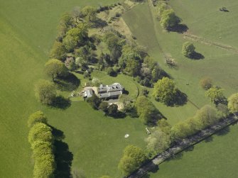 Oblique aerial view centred on the cottage, taken from the NE.
