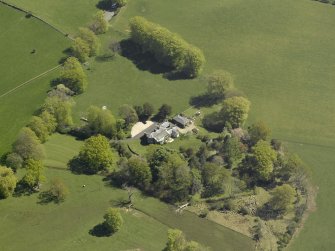 Oblique aerial view centred on the cottage, taken from the WNW.