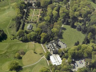 Oblique aerial view of Belleisle House with the walled garden and greenhouse adjacent, taken from the NE.