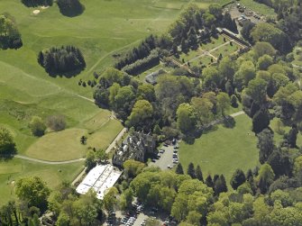 Oblique aerial view of Belleisle House with the walled garden and greenhouse adjacent, taken from the N.