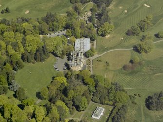 Oblique aerial view of Belleisle House with the walled garden and greenhouse adjacent, taken from the SW.