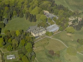 Oblique aerial view of Belleisle House with the walled garden and greenhouse adjacent, taken from the SE.