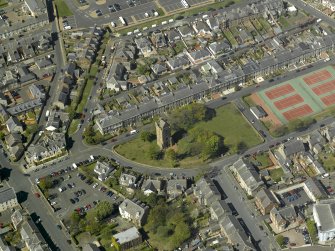Oblique aerial view centred on St John's Tower, taken from the SE.