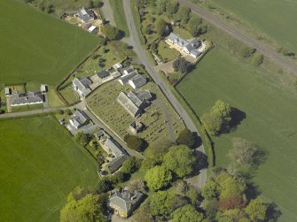 Oblique aerial view centred on the Church with the manse adjacent, taken from the ESE.