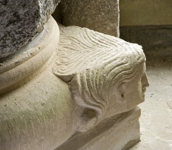 Interior. S aisle, recess, detail of carved head on column base