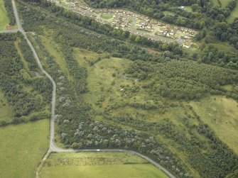 Oblique aerial view centred on the remains of an anti-aircraft battery, taken from the NNE.