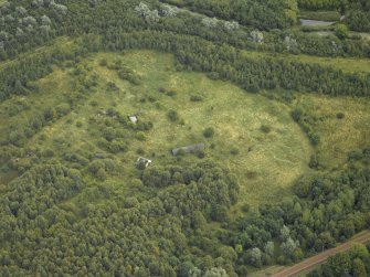 Oblique aerial view centred on the remains of an anti-aircraft battery, taken from the W.