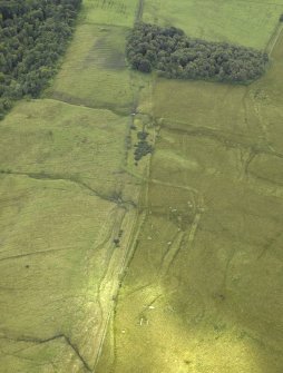 Oblique aerial view centred on the decoy site with the control bunker adjacent, taken from the NE.