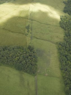 Oblique aerial view centred on the decoy site control bunker, taken from the SW.