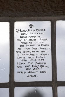 Interior. Detail of prayer written on window pane