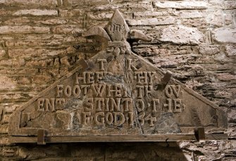 Interior. Detail of inscribed pediment on W wall