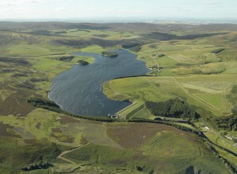 General oblique aerial view centred on the resevoir with the remains of the fort adjacent, taken from the E.