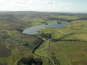 General oblique aerial view centred on the resevoir with the remains of the fort adjacent, taken from the E.