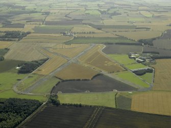 General oblique aerial view centred on the airfield, taken from the NNE.