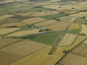 General oblique aerial view of the airfield, taken from the SSW.