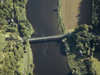 Oblique aerial view centred on the chain bridge with the fishing shiel adjacent, taken from the N.