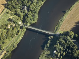Oblique aerial view centred on the chain bridge with the fishing shiel adjacent, taken from the N.