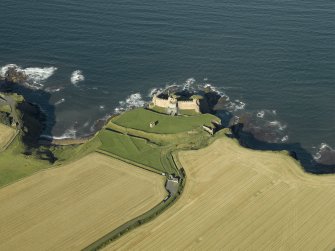 Oblique aerial view centred on the castle, taken from the SW.